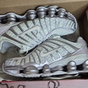Nike Shox Running Sneakers in Metallic Silver and White